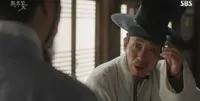 Cena do episódio 8 de A Flor Nokdu
