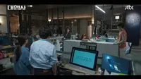 Cena do episódio 8 de Agency