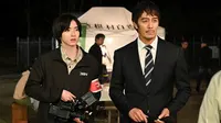 Cena do episódio 8 de News Anchor